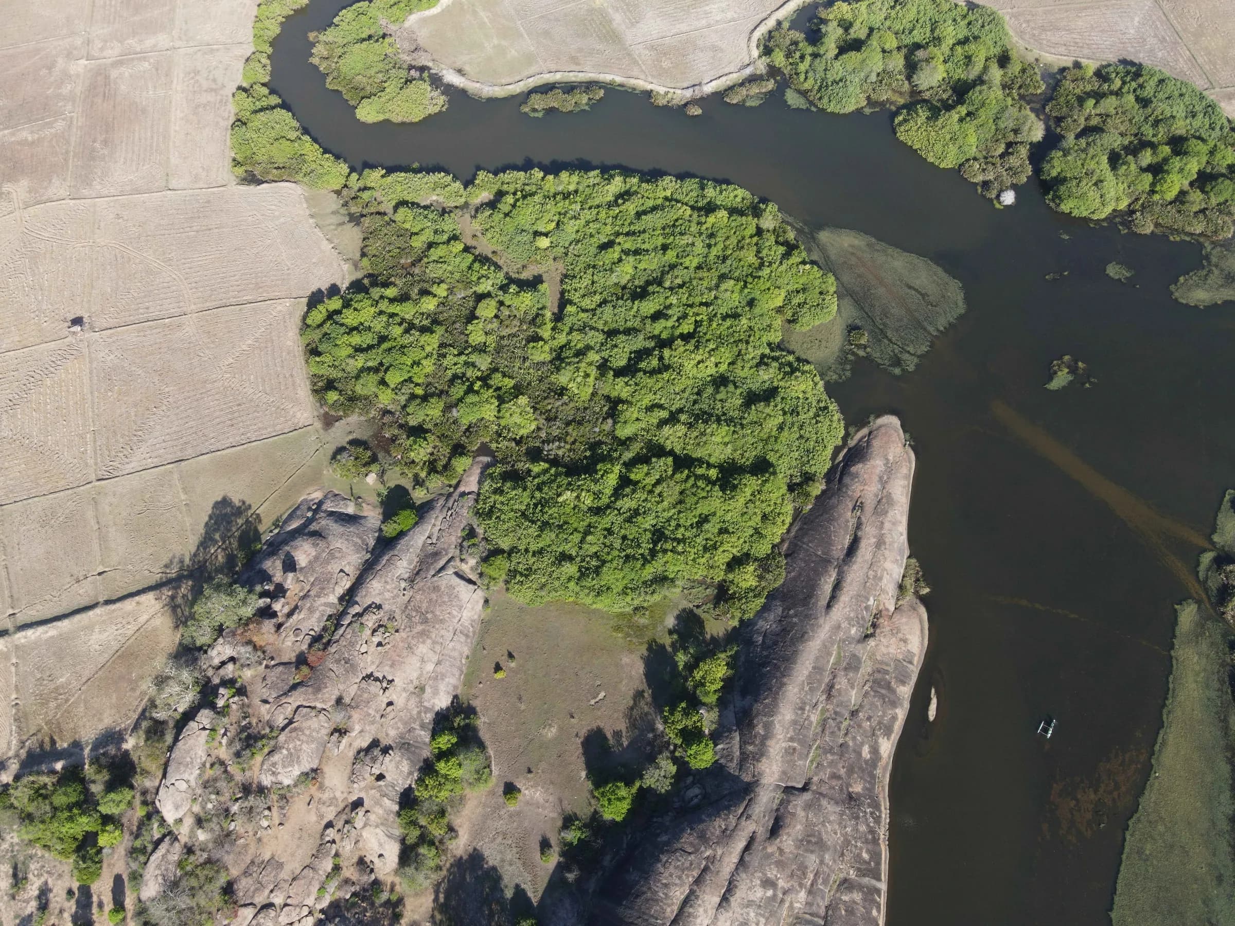 Aerial view of Arugam Bay's coastline and lagoon